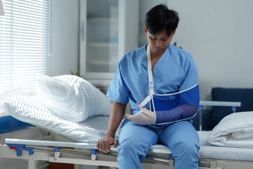 atient recovering with arm sling during ⁠Post Surgery Rehabilitation Sherwood Park, Pre Surgery Rehabilitation Sherwood Park physiotherapy treatment.